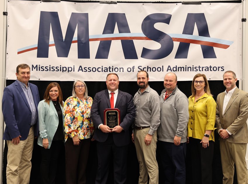 Dr. Lundy Brantley was named Mississippi’s Superintendent of the Year on Oct. 22 during the annual meeting and leadership conference of the Mississippi Association of School Administrators. At the presentation are, from left, Neshoba County Assistant Superintendent Tommy Holland, Work-based Learning Coordinator Dana McLain, Neshoba Elementary Principal Tiffany Plott, Brantley, Neshoba Middle School Principal Jacob Drury, Neshoba Central High School Principal Jason Gentry, Assistant Superintendent Dr. Penny Hill and School Board member Davis Fulton.